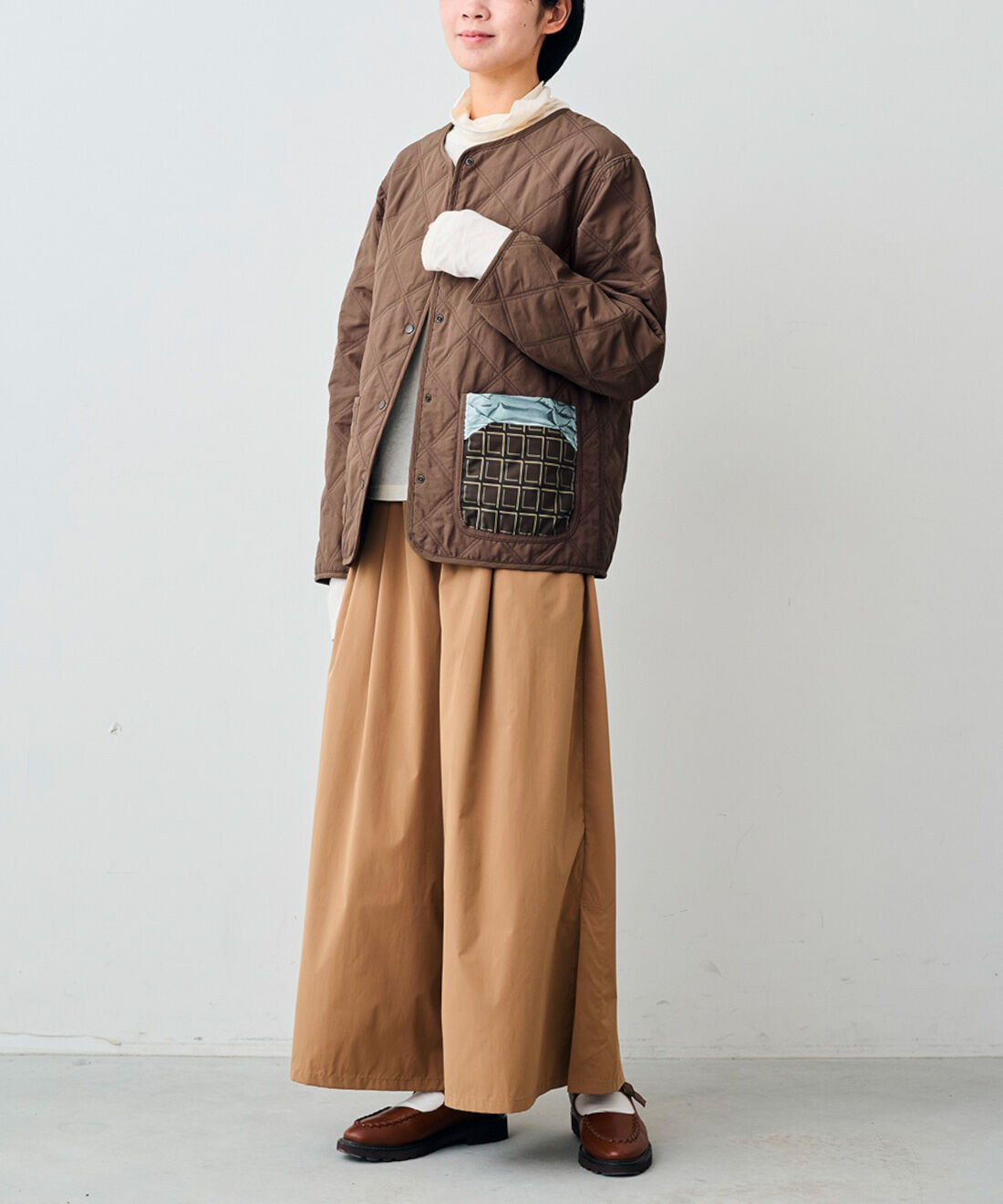 realstock [リアルストック]（Express BOX）|【3～10日でお届け】リブ　イン　コンフォート　チョコレートバイヤーみりとコラボ　甘美な誘惑をまとう　ボンボンショコラ柄のキルティングリバーシブルコート〈チョコレートブラウン〉