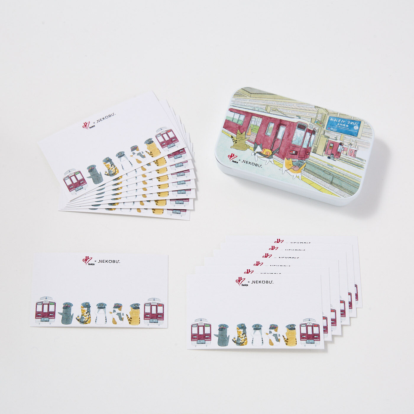 Real Stock|阪急電鉄×猫部　沿線風景を楽しむ缶入りメッセージカード|1回のお届けセット例です。メッセージカードはたっぷり15枚入り。