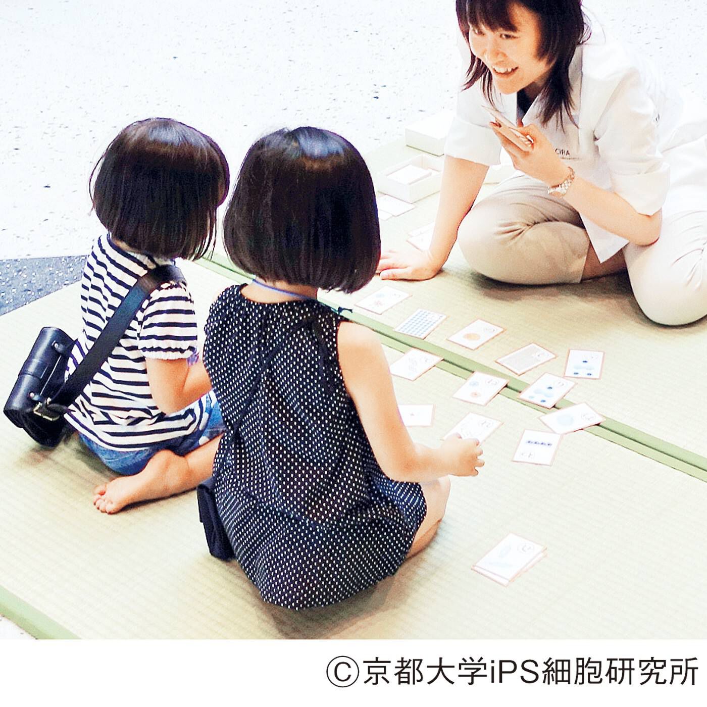 merry［フェリシモメリーポイント］|iPS細胞研究支援|研究用の白衣を着て子ども向けワークショップを行うサイエンスコミュニケーター