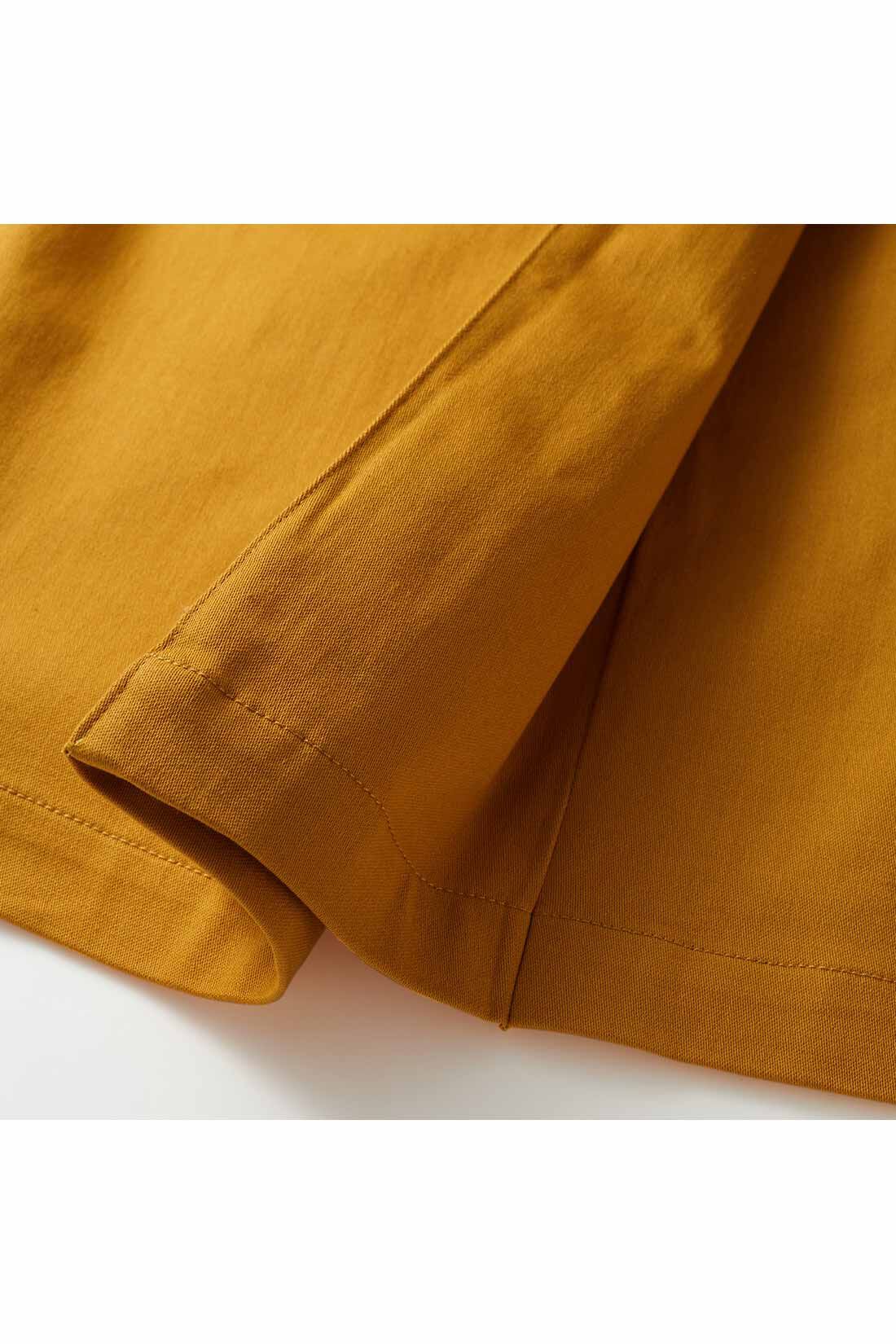 IEDIT|IEDIT[イディット]　ラップ風ストレッチロングスカート〈マスタードイエロー〉|ラップスカートに見えて、実はつながっている折り返しデザイン。