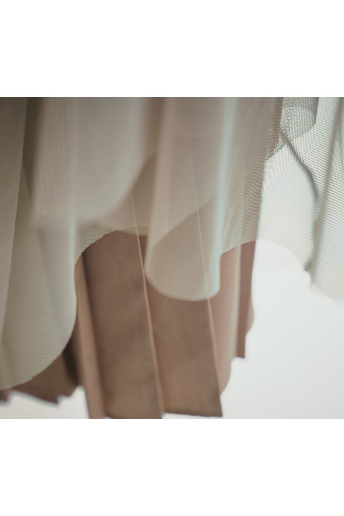 IEDIT[イディット]　プリーツデザインのチュールレイヤードスカート|プリーツ生地の上に、チュールを重ねたこだわりのデザイン。
