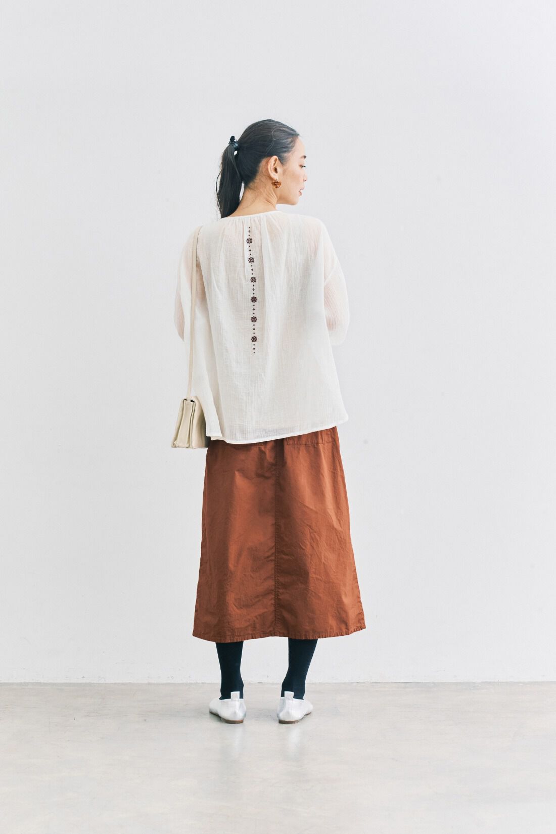 and myera［アンドマイラ］|and myera 巻き風スカート〈キャメル〉