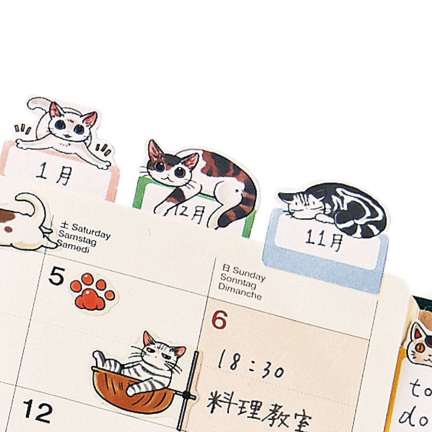 猫部|漫画家 山野りんりんさんとつくった　スケジュールが大盛り上がり　猫まみれ手帳シールの会|ひょっこり飛び出すインデックスシールも便利。