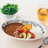 猫とお花のカレーが入る深型オーバル皿