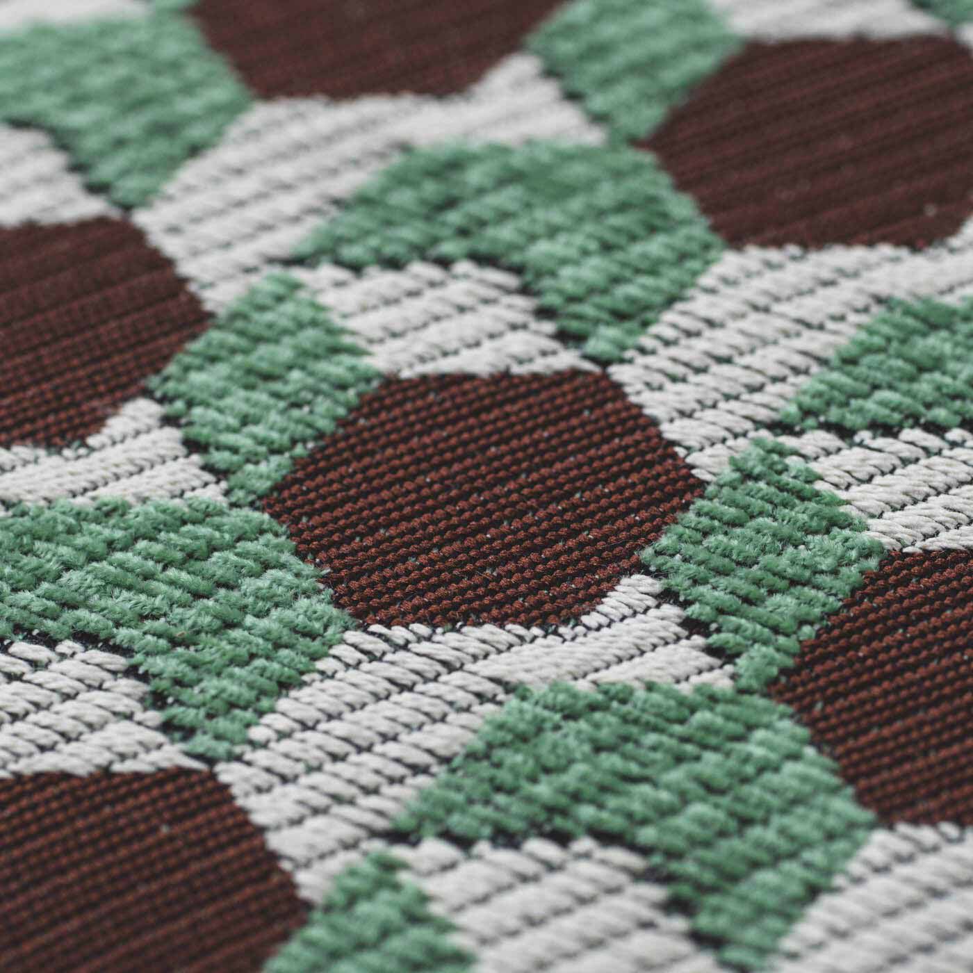 ＆Stories|テキスタイルデザイナーと家具職人が作った 播州ジャカード織のスツール〈チョコミント色〉|このスツールのために、世界的に活躍されるテキスタイルデザイナー・梶原加奈子さんへ新たにデザインを依頼し、椅子の張り地用の素材で織り上げました。