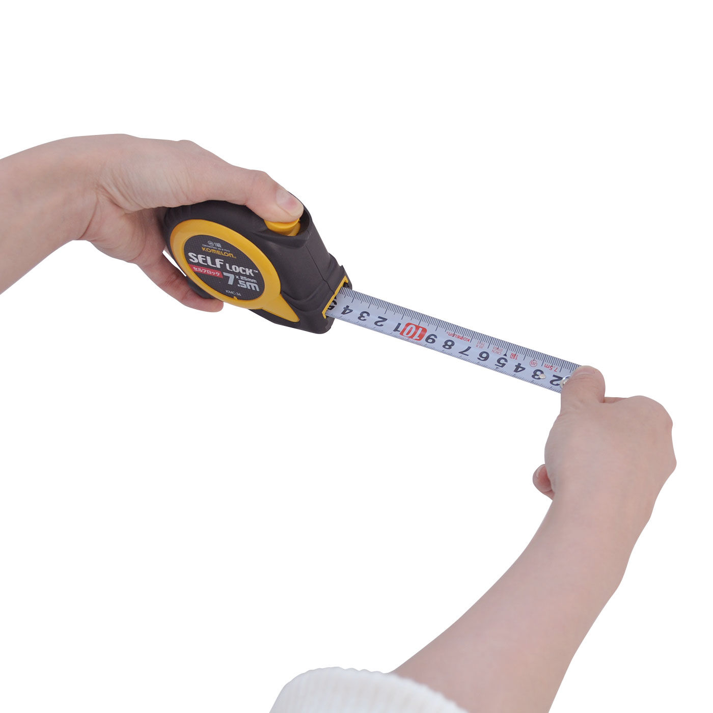 フェリシモ女子DIY部ダイレクト便|セルフロックメジャー  7.5m×テープ幅25mm|メジャーを右に引き出したところ