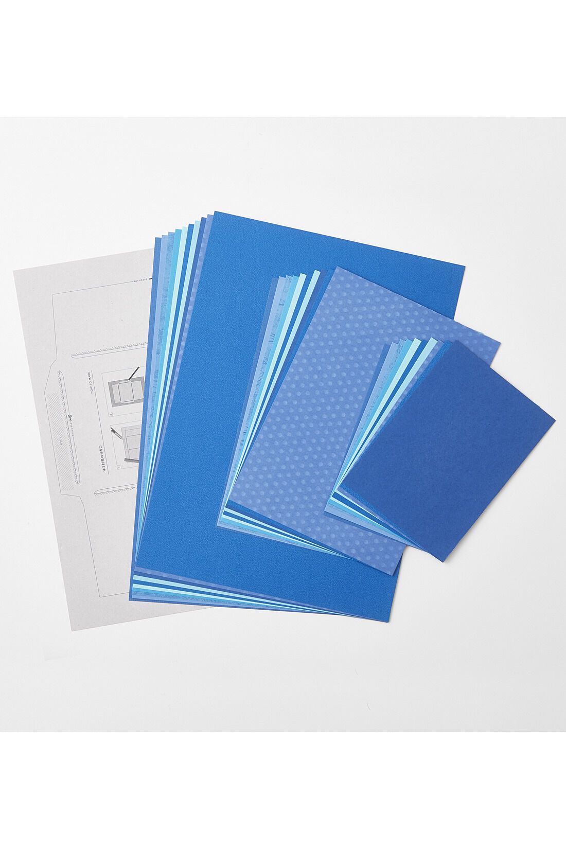 OSYAIRO|OSYAIRO 紙の専門商社竹尾が選ぶ　色を楽しむ紙セットの会〈青〉|A4・A5・A6サイズ各10枚（10銘柄）と封筒用型紙をセットにしてお届け