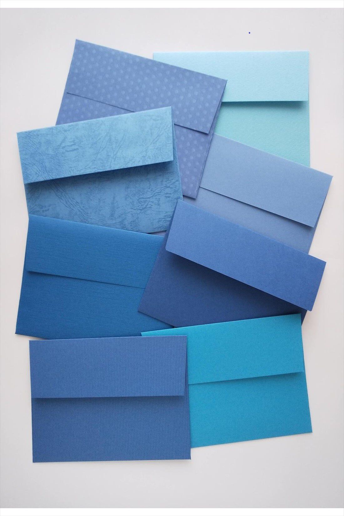 OSYAIRO|OSYAIRO 紙の専門商社竹尾が選ぶ　色を楽しむ紙セットの会〈青〉|A4の紙で作った封筒たち。手づくりの楽しさも。