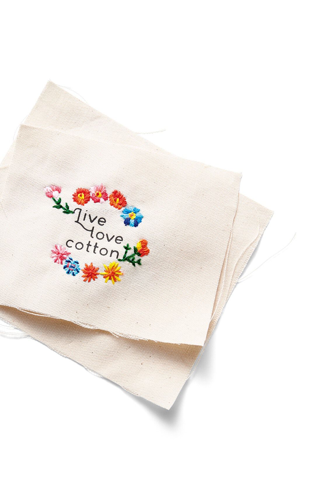 Live in  comfort|Live love cotton（R）プロジェクト　リブ イン コンフォート　インドの刺しゅうガールズとつくった　つながるフラワー　オーガニックコットンボーダートップス〈ブラック×オフホワイト〉