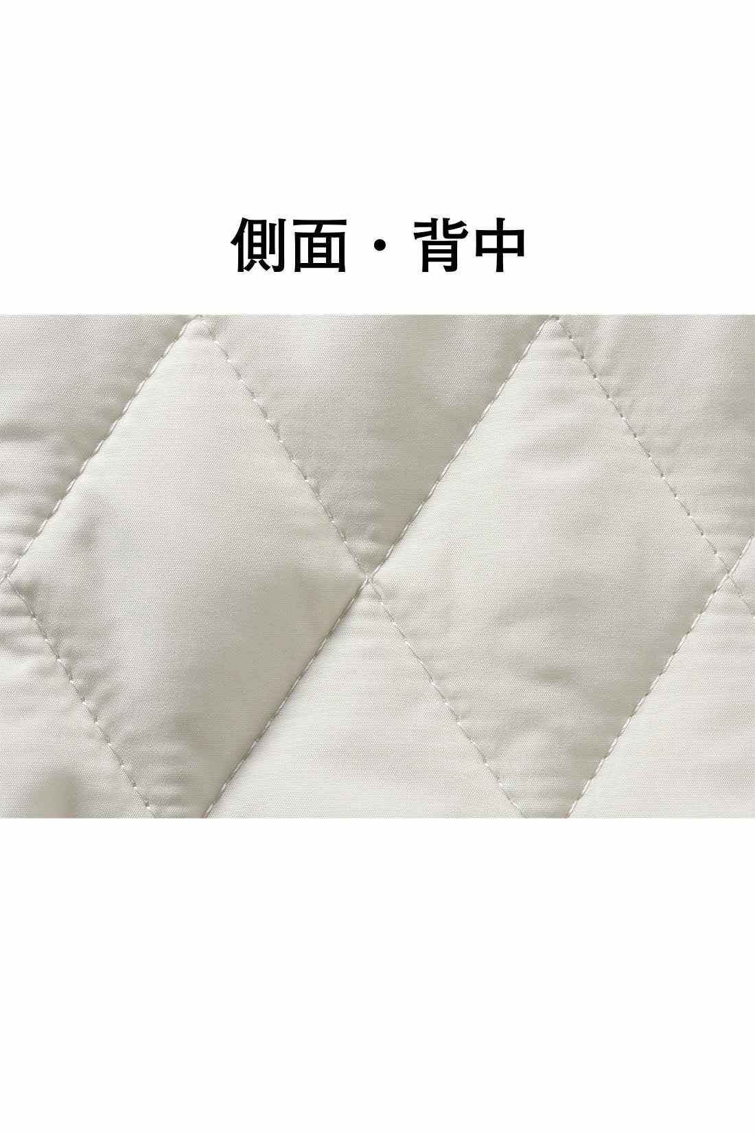 Live in comfort［リブインコンフォート］|リブ イン コンフォート キルティングと裏起毛の異素材遣いチュニック|前身ごろは裏起毛素材、側面から背中をキルティング生地で切り替えて、あったかさも着映え感もアップ。
