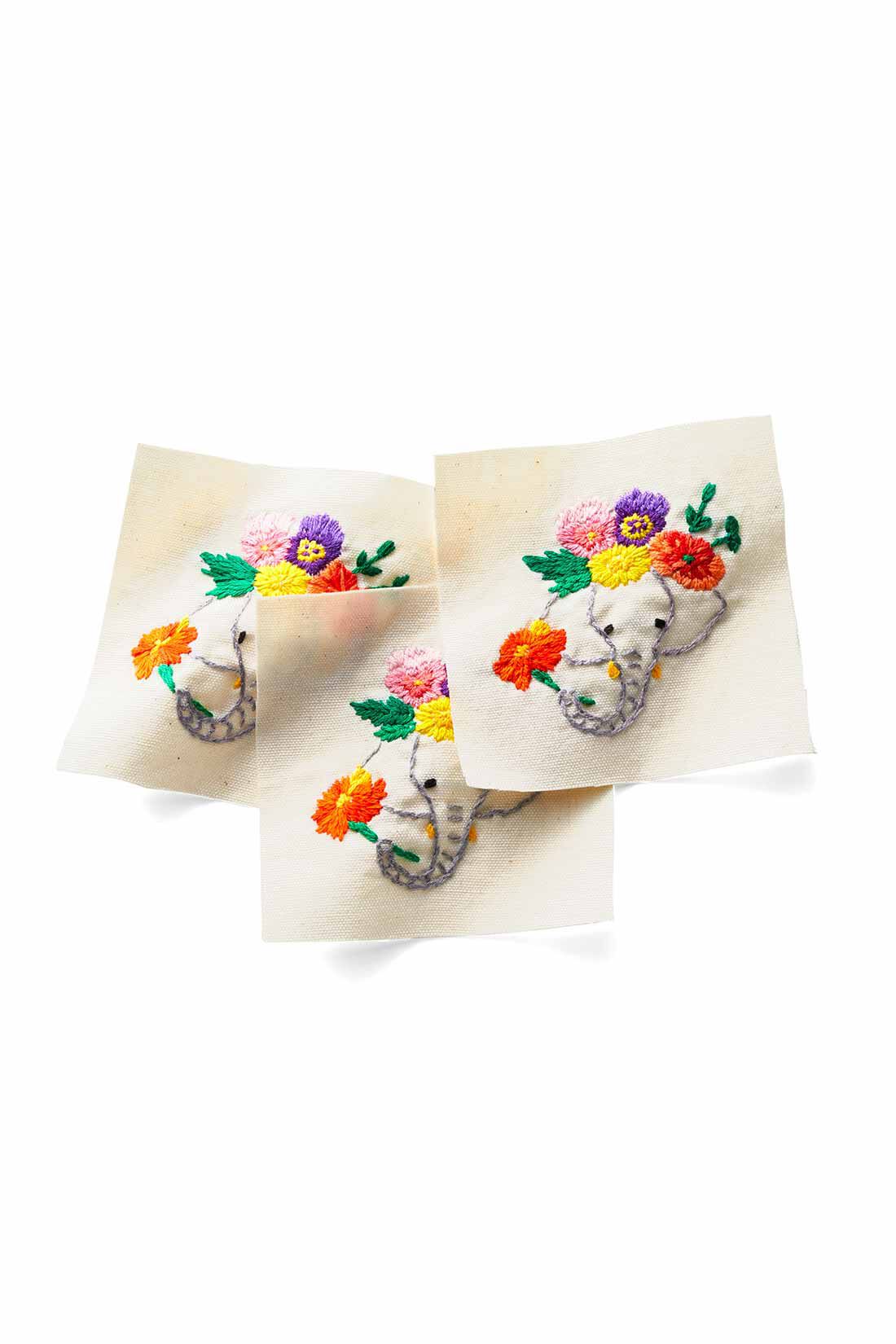 Live in comfort［リブインコンフォート］|リブ イン コンフォート Live love cotton（R）プロジェクト インドと日本をつなぐ 花冠をつけた象さん刺しゅうのハーフスリーブトレーナー|インドの刺しゅうガールズによってゾウさんの表情に違いが♪ どんなコが届くのか、お楽しみに！