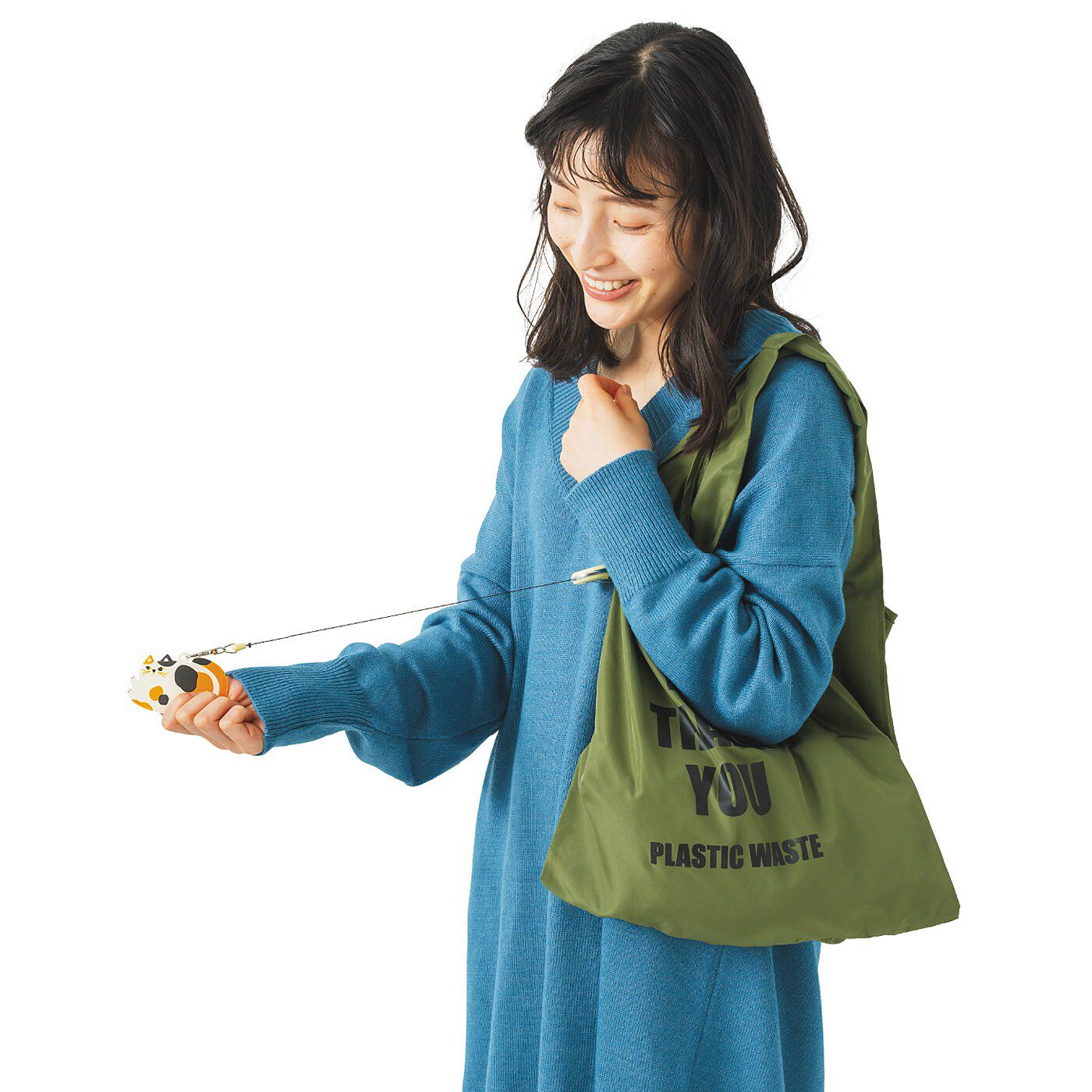フェリシモの雑貨 Kraso|お買い物バッグに付けて便利！　ポリ袋の開けにくいを解消 シリコーンオープナーの会|バッグに付けておけばリールで伸ばしてサッと使えます！