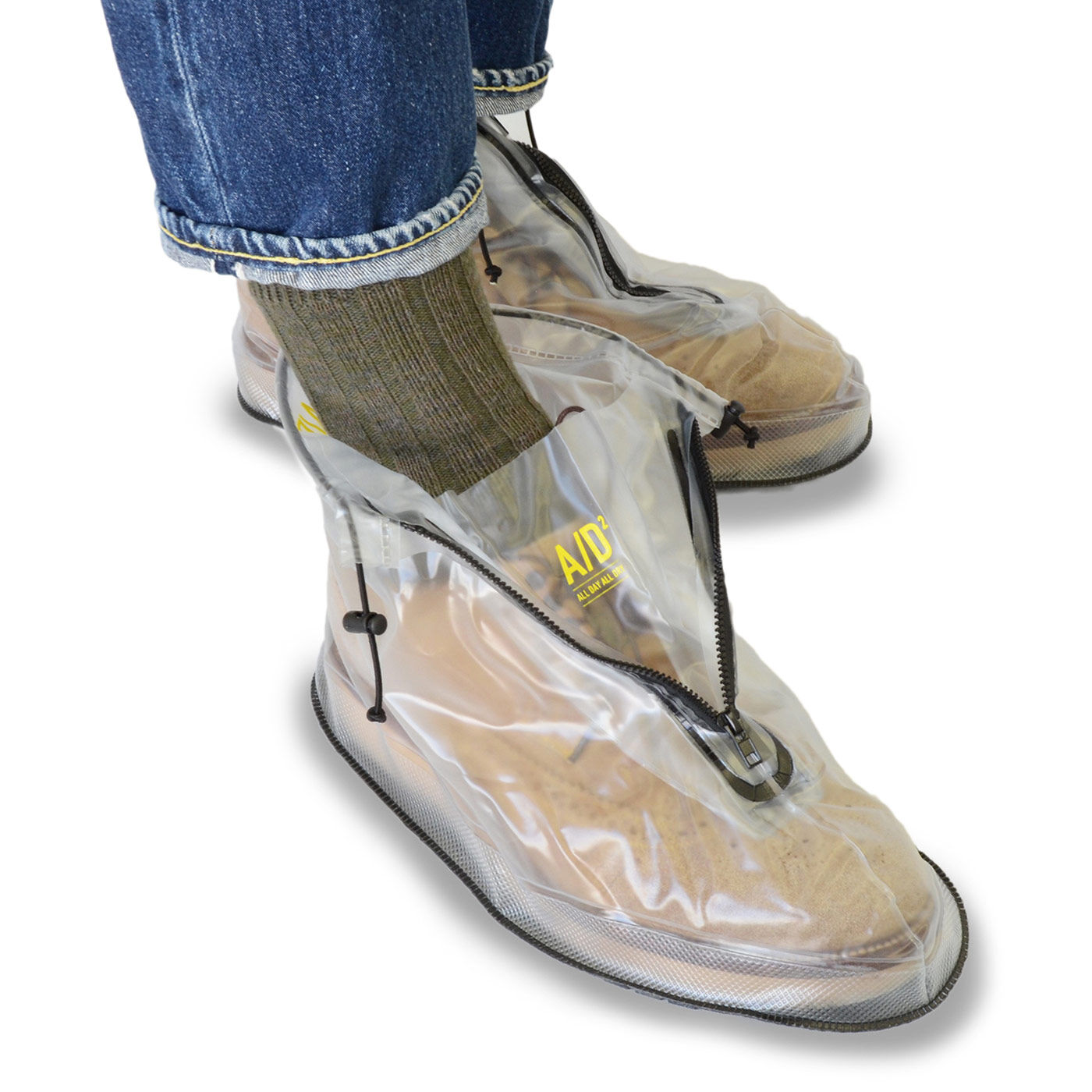 フェリシモの雑貨Kraso|靴を雨や泥から守る　たたんで持ち歩けるシューズレインカバー〈黒〉|※画像は色違いの透明のLサイズ〈透明〉。
