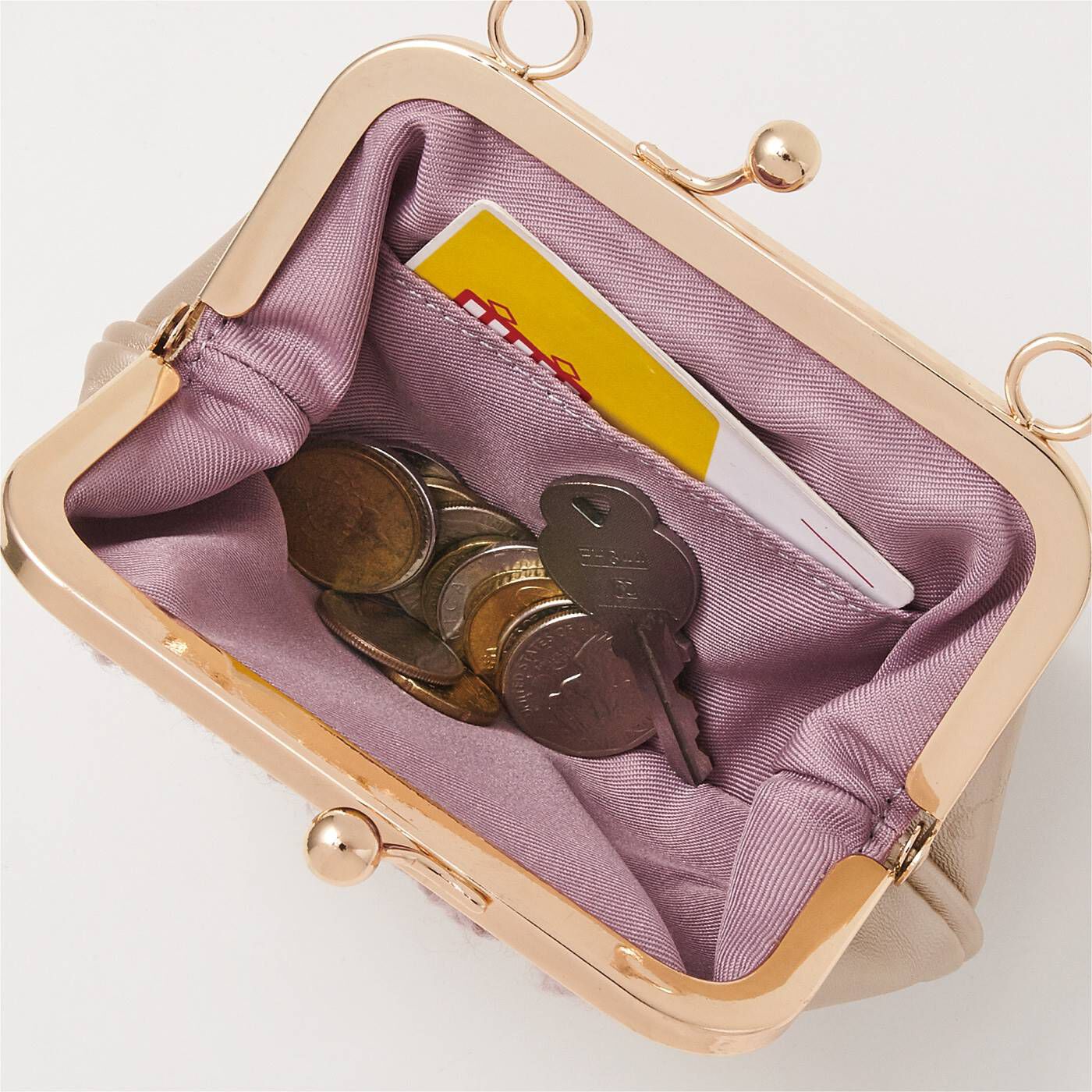 フェリシモの雑貨 クラソ|UP.de　一緒に街を歩きたい　おすましマドモアゼルのハンドバッグみたいながま口ポーチの会|ICカードとお金を入れてミニ財布に。