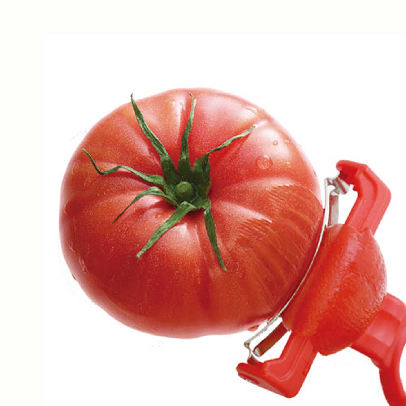 フェリシモの雑貨Kraso|湾曲ギザ刃がトマトにフィット！ ののじ トマトピーラー|トマトの大きさや形によて、刃のカーブに合うように方向を使い分けてください