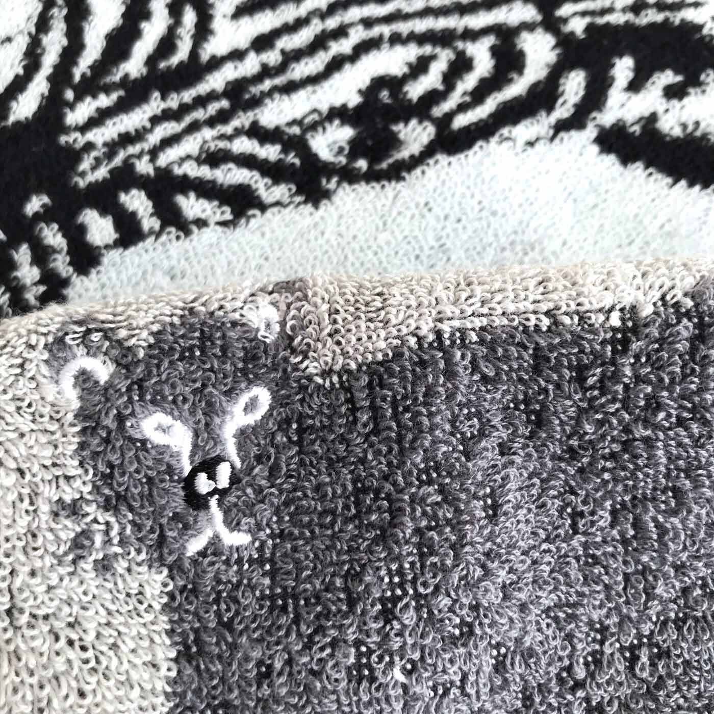 フェリシモの雑貨 Kraso|ミロコマチコ　モノクロハンドタオル|ダイナミックなデザインを織り柄で再現。カッコイイ。