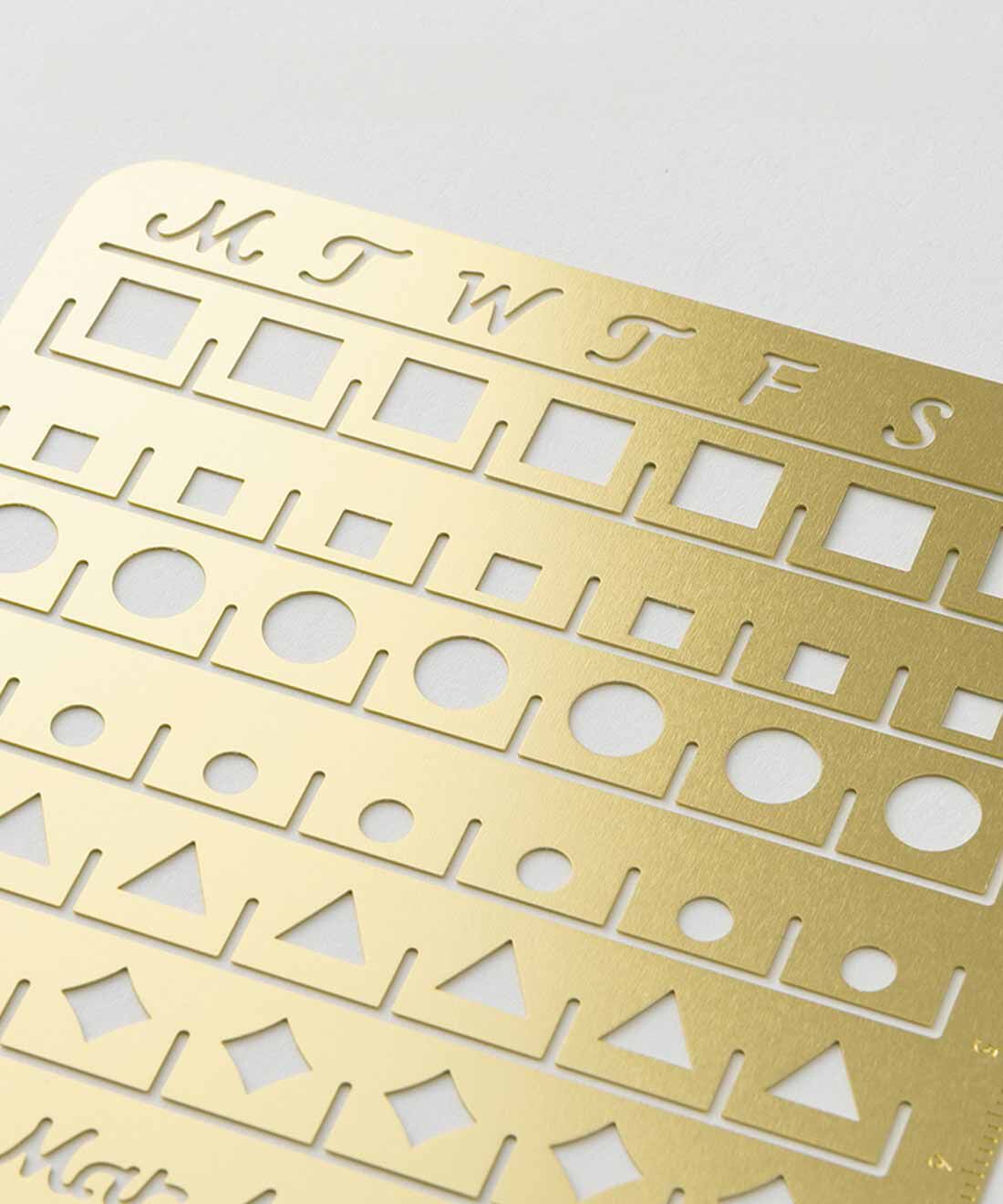 ミニツク|すべらず書きやすい 真ちゅう製 手帳テンプレート カレンダー〈L〉|経年による風合いの変化を楽しめる真ちゅう製です。