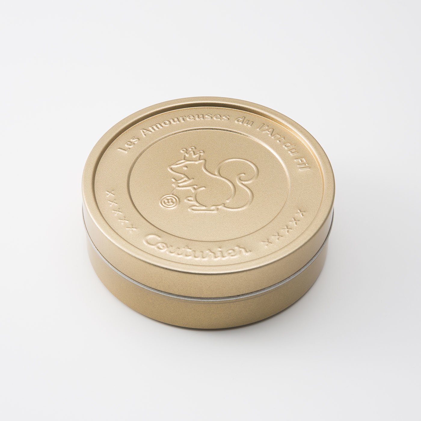 クチュリエ リスの金メダル缶