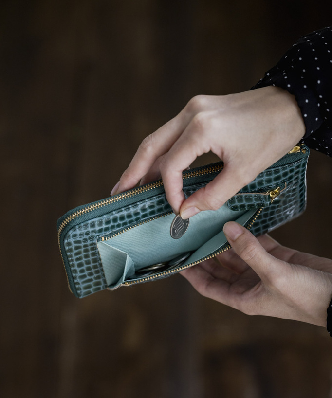 
使うたびに「祝福」を感じる艶財布。
